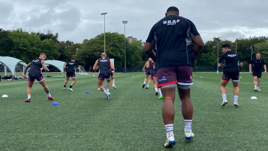 UKAF rugby players move around the cones as they prepare for IDRC