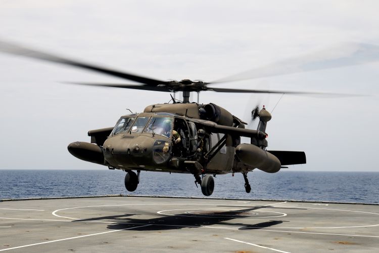 US Army UH60L Black Hawk helicopters on board RFA WAVE KNIGHT assist with aid response in Haiti 19082021 Credit MOD Crown Copyright.jpg