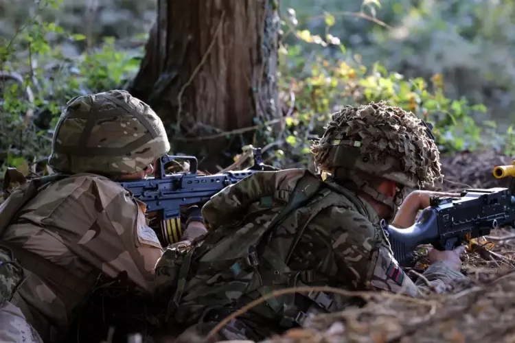 Ukrainian recruits taking part in shooting training in the UK
