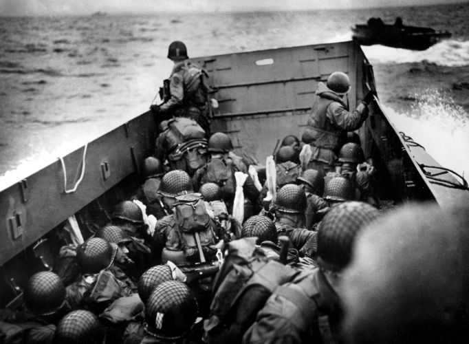 American soldiers in a landing barge sail across the Channel ahead of landing in Normandy (Picture: TopFotoP/PA).
