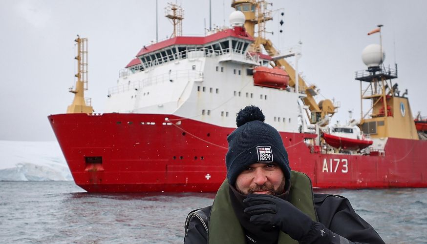 A member of the crew of HMS Protector out on the water (Picture: Royal Navy).