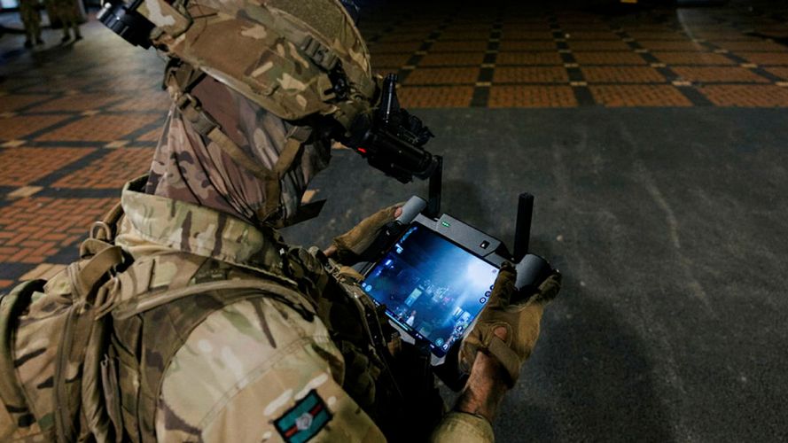A drone pilot is sets off his drone to be used for surveillance in an Urban trial at night during LIVEX 23 (Picture: MOD).