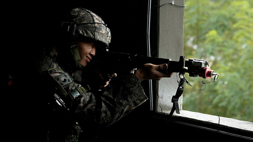 A soldier from the Republic of Korea Army watching over their Arcs of fire during the Defensive phase on Exercise IMJIN WARRIOR (Picture: MOD).
