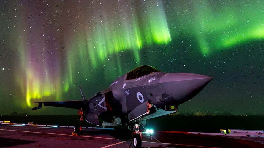 F-35B lightning jets on the flight deck of Prince of Wales under Aurora Borealis (Picture: MOD).