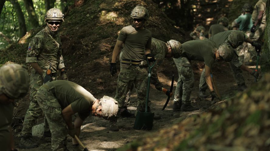Soldiers from 10 Queen's Own Gurkha Logistic Regiment (10 QOGLR) digging out fire breaks within the woodblocks in Wales by hand (Picture: MOD) Army steps in to help with South Wales wildfires pic MOD