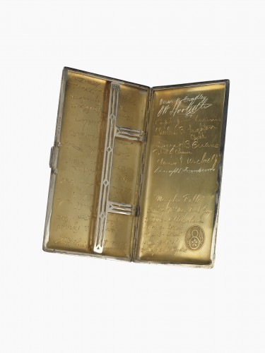 Wyler's cigarette case has signatures from the Memphis Belle's crew, and General Eisenhower.