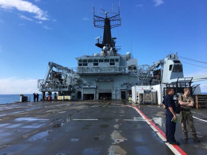 Aviation Officer, Lieutenant Sebastian Gamwell and Forces TV's minder, Officer Jay Dyson, on board HMS Bulwark
