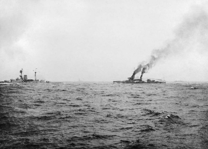 © IWM (SP 604) HMS REVENGE and HMS HERCULES part of the First Battle Squadron underway before the battle. The Squadron was commanded by Vice Admiral Sir Cecil Burney and included the ships Marlborough, Agincourt, Colossus, Collingwood, Neptune St Vincent and Bellona.