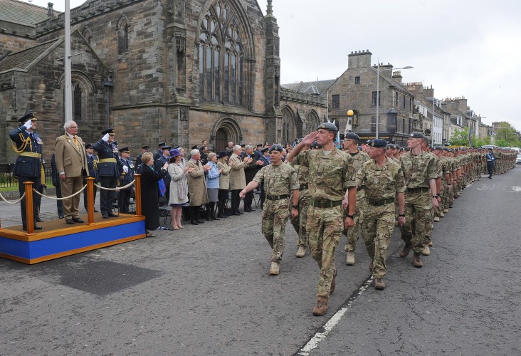 58 Squadron personnel take the salute as they march past the dias during the Freedom of St Andrews Parade.

Picture: Crown Copyright 2014 / Royal Air Force / SAC Rich Dudley