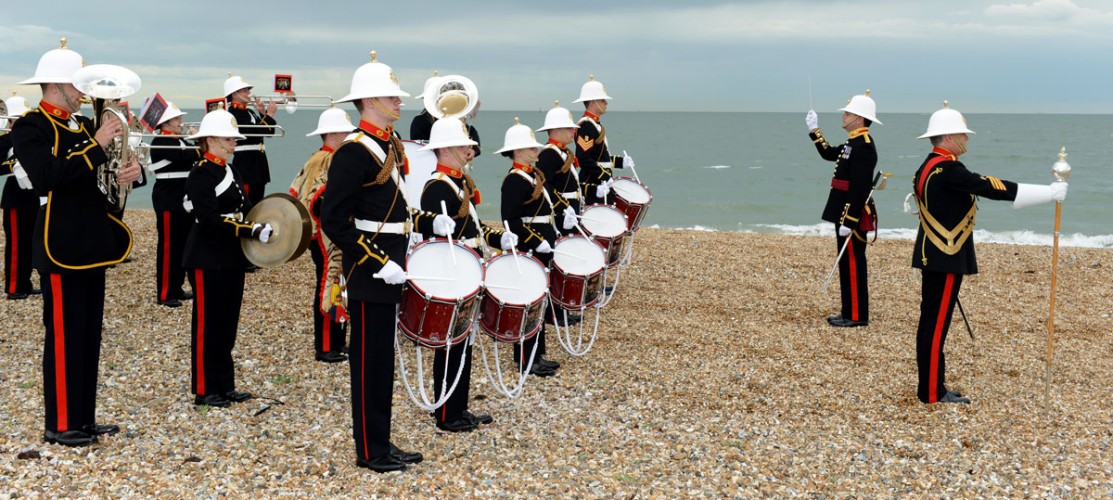 They were greeted at Eastney beach by fanfares and a display by musicians from the Royal Marines School of Music.