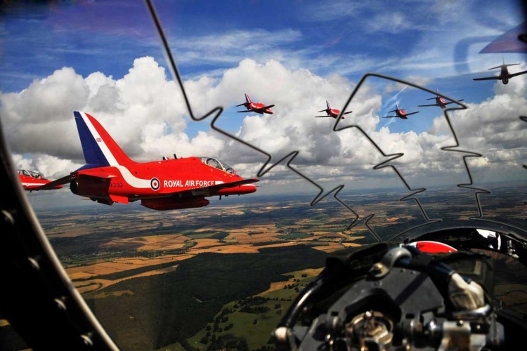 The Red Arrows are pictured flying over Scotland, taken from the cockpit of one of their aircraft.

Photo Crown Copyright 2009