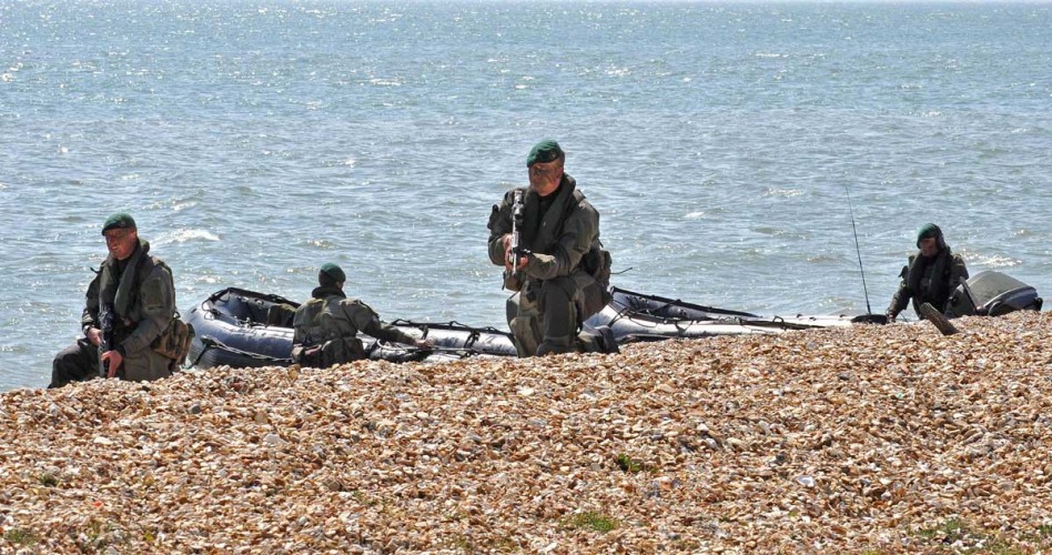 HMS Bulwark used Browndown beach in Gosport, Hampshire to practice the ships amphibious capability by sending landing craft manned by Royal Marines from the ship to the beach and flying a Merlin and Sea King Helicopter to provide air cover.