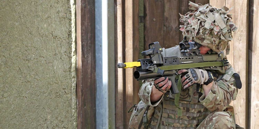 Members of 15 Squadron RAF Regiment respond to a staged attack on a mock Afghan Police Station at the Stanford Training Area (STANTA) in Norfolk during the final exercise before deploying to Afghanistan.