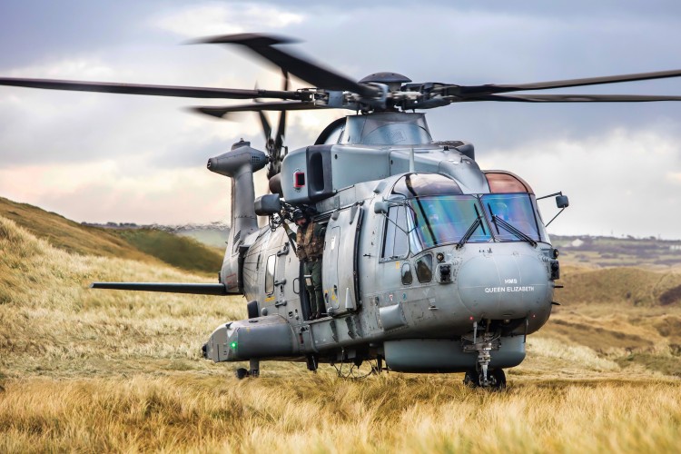 Pictured are 820 Naval Air Squadron making the most of the Cornish Landscape to hone their Fly Navy skills.  A local photographer, Greg Caygill, caught the Merlin Mk2 helicopter in the sand dunes near Perranporth beach. 