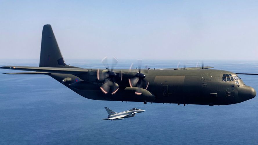 A Hercules C-130 from 47 squadron accompanied by a Typhoon on a final fly-past before its forthcoming retirement (Picture: MOD).