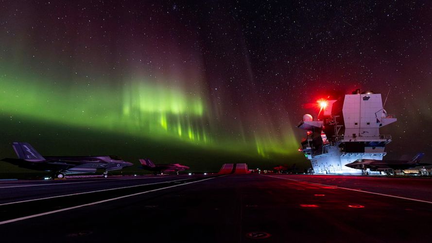 On 3 March sailors on HMS Prince of Wales lucky enough to be keeping watch on the bridge, or able to get out on the flight deck, were treated to a stunning display of Aurora Borealis, with pink and green colours lighting up the sky (Picture: MOD).