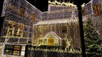 The house with all of its 300,000 lights sparkling bright in the darkness