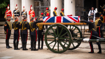 LBdr Sullivan's coffin travelled by gun carriage from The Royal Mews to The Guards' Chapel, Wellington Barracks in central London