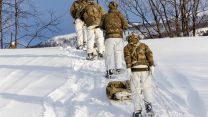 Royal Marines of the Commando Logistics Regiment prepare to place supply caches during Exercise Cold Response in Norway