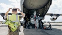 Upon arrival at RAF Akrotiri it was time to reverse the process, with personnel checking the Wildcat's landing gear was lined up with the unloading ramps