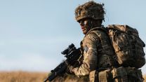 Lance Corporal Ashbee keeps a close eye on the members of his fire team during a section attack - a section is usually comprised of two fire teams, Charlie and Delta