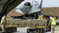 Munitions are unloaded at the Romanian air base so the RAF jets can fulfil their Nato air policing role to the fullest extent if required