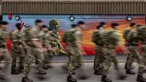07082025 Royal Marine Troop march past Falklands Yomper Mural at the Commando Training Centre in Lympstone, Devon CREDIT Royal Navy