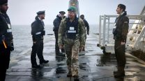 First Sea Lord General Sir Gwyn Jenkins went aboard to personally welcome the submariners home