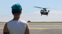 The families of the detachment from 820 Naval Air Squadron waited patiently for their loved ones to return (Picture: MOD)