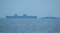 HMS Prince of Wales and HMS Richmond carry out a boat transfer 