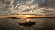HMS Tamar sails during a sunset off the Australian coast (Picture: Royal Navy)