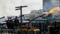 Members of the Honourable Artillery Company fire a salute with three 105mm L118 Light Guns at the Tower of London to mark the fourth anniversary of the King's accession to the throne