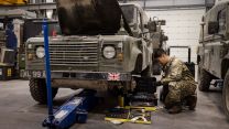 A lance corporal from the King's Royal Hussars Light Aid Detachment uses the new Vehicle Maintenance Kit on a Land Rover at Tidworth - the new kit is significantly more comprehensive and is also more portable