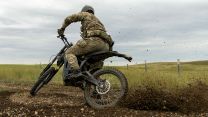 A soldier from 2 Para's Anti-Tank Platoon rides across the prairie on a Sting e-bike during Exercise Rhino Bizz at British Army Training Unit Suffield in Canada - an area better known as BATUS