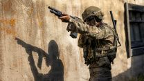 A soldier from 2nd Battalion, The Parachute Regiment carries out a live fire exercise to counter drone threats using a Mossberg 590M shotgun