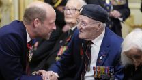 Prince of Wales and veteran Ron Gumbley at a commemorative event marking 80th anniversary of VJ Day 