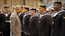 Prince Charles gives out Afghanistan campaign medals to Navy personnel in July 2010 (Picture: PA Images)