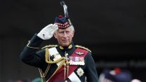 Prince Charles takes the salute from the march past of 2,000 serving personnel, veterans and cadets in Edinburgh on Armed Forces Day 2011 (Picture: PA Images)