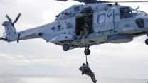 While by air, operators fast-roped from a Merlin helicopter operated by 824 Naval Air Squadron