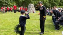 Cadet forces also paid their respects, with Rear Admiral Perks returning the salute from a young wreath-bearer (Picture: Leigh Dodds)