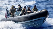 Members of 47 Commando and Seaman Specialists conduct boat training serials in the Caribbean Sea, checking the range of their comms with HMS Trent
