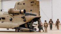 Royal Netherlands Air Force personnel from 298 Squadron board a Dutch Chinook at RAF Odiham, where Chinooks from both forces carried out medical training on Exercise Medic Falcon