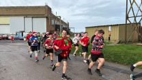 All smiles as personnel begin their festive themed run