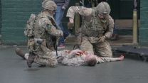 1st Battalion soldiers practice giving emergency aid and extracting a casualty