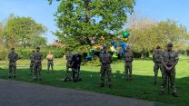 1st Battalion The Yorkshire Regiment stand with Captain Sir Tom Moore at the end of his fundraising challenge (Picture: MOD).