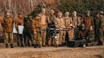The Japanese Ground Self Defence Forces' show off their drone to paratroopers from the reconnaissance platoon, D Company 