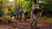 Tri-service training personnel take on a Gurkha-run challenge at Army Training Centre Pirbright, where they carry a traditional Nepalese bamboo basket known as a Doko, weighing 15kg, over a five-kilometre course