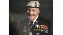 Mr Shelley pictured with his medals in earlier years 