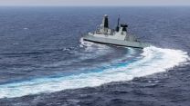 HMS Dragon is snapped from a Wildcat helicopter as the ship conducts high-speed manoeuvres as she continues to carry out air defence operations in the Eastern Mediterranean (Source: MOD)
