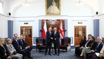 Sir Keir and Mr Tusk are flanked by their teams during the bilateral meeting (Picture: PA)